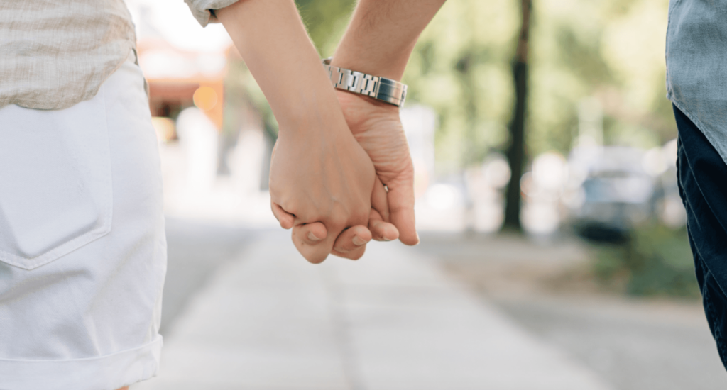 couple holding hands