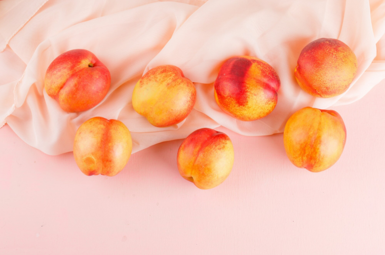 peaches on pink background for male anal orgasm article