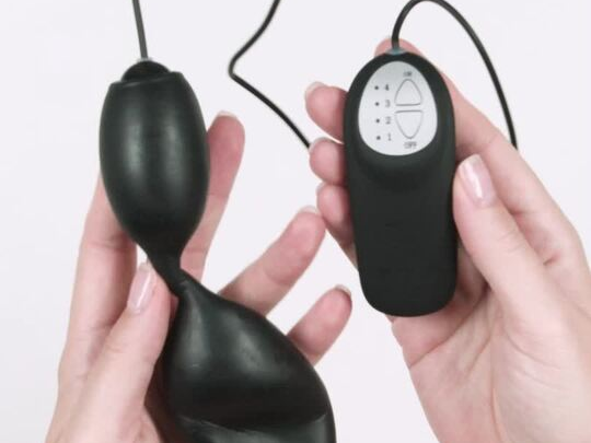 Alt: Hands holding the Tracey Cox Supersex Male Vibrator