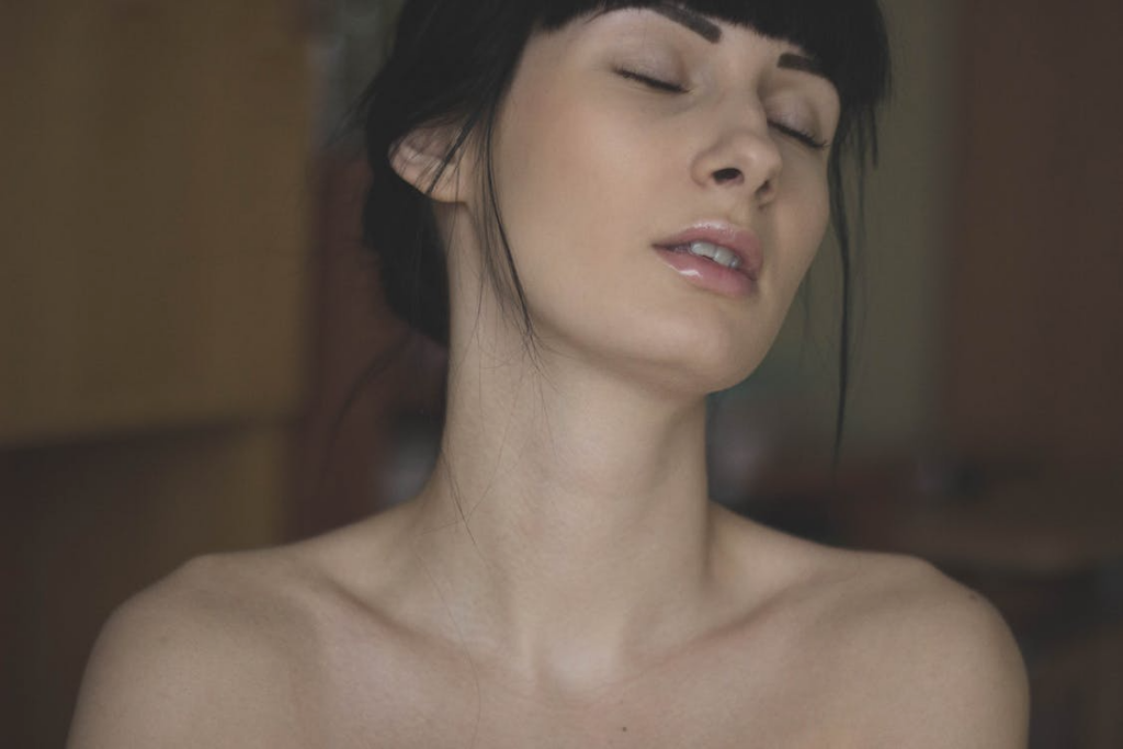 Woman's pleasure face with hands-free orgasms