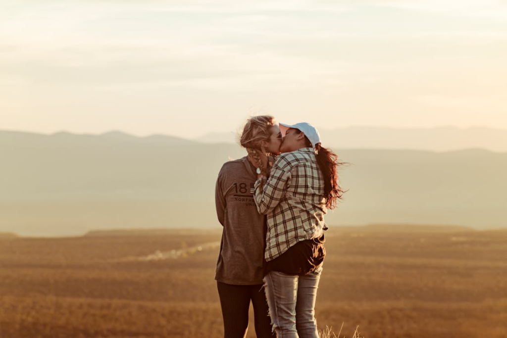 Lesbian couple kissing, physical touch love languages in relationships