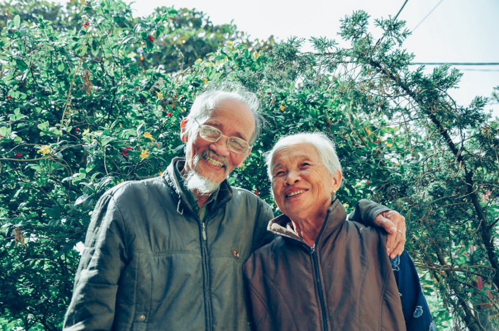 old Asian couple smiling